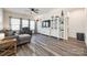 Cozy living room featuring hardwood floors and built-in shelving at 7133 Yardley St, Gastonia, NC 28056