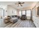 Comfortable living room featuring hardwood floors, a ceiling fan, and lots of sunlight at 7133 Yardley St, Gastonia, NC 28056