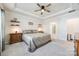 A view of the main bedroom with a large bed, and an ensuite bathroom with a shower at 7133 Yardley St, Gastonia, NC 28056