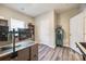 Well-lit office with desk, storage, and light hardwood flooring at 7133 Yardley St, Gastonia, NC 28056
