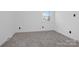 Cozy bedroom with plush carpet and natural light at 7215 Kilcullen Dr, Charlotte, NC 28270
