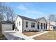 The home has a detached garage and a well-maintained yard; a cozy and inviting place to live at 7215 Kilcullen Dr, Charlotte, NC 28270