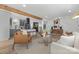 Spacious living room with an open floor plan, modern decor and seamless flow to the kitchen at 7215 Kilcullen Dr, Charlotte, NC 28270