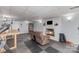 Finished basement with fireplace, lounge seating, and space for exercise equipment at 748 Saint Cloud Dr, Statesville, NC 28625