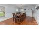 Spacious dining room with hardwood floors and ample natural light, ideal for Gathering gatherings at 748 Saint Cloud Dr, Statesville, NC 28625