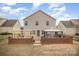 Aerial view of the backyard, patio, outdoor dining area and gazebo provides a great entertaining space at 8134 Chatham Oaks Dr, Concord, NC 28027