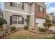 Two-story home featuring siding, brick and well-manicured landscaping at 8134 Chatham Oaks Dr, Concord, NC 28027