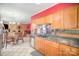 View of the kitchen and dining area with stainless steel appliances at 8134 Chatham Oaks Dr, Concord, NC 28027