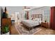 Comfortable bedroom featuring wood floors, a ceiling fan, and a neutral color palette at 8408 Williamsburg Cir, Huntersville, NC 28078