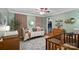 Cozy Bedroom with decorative rug, daybed, and ample storage, creating a warm and inviting space at 8408 Williamsburg Cir, Huntersville, NC 28078