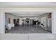 Spacious garage with ample storage and modern organization systems, perfect for car enthusiasts or hobbyists at 8408 Williamsburg Cir, Huntersville, NC 28078