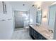 Bathroom with double sink vanity, marble floors, and large shower at 881 Saluda Rd, Chester, SC 29706