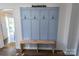 Inviting entryway with wainscoting, coat hooks, and a convenient bench at 881 Saluda Rd, Chester, SC 29706