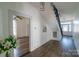 Open hallway with hardwood floors and access to multiple rooms at 881 Saluda Rd, Chester, SC 29706