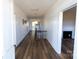 Bright hallway leads to stairs and multiple rooms in the home at 881 Saluda Rd, Chester, SC 29706