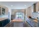 This kitchen boasts an island with seating, stainless appliances, and an eat-in area by the window at 881 Saluda Rd, Chester, SC 29706