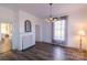 Bright living room features hardwood floors and natural light from the window at 881 Saluda Rd, Chester, SC 29706