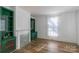 Charming living room with hardwood floors and decorative built-in shelving at 881 Saluda Rd, Chester, SC 29706
