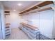 Spacious walk-in closet featuring custom shelves and drawers for optimal organization and storage at 881 Saluda Rd, Chester, SC 29706