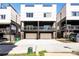 Modern townhome with a two-car garage and balcony area at 904 Van Every St, Charlotte, NC 28205