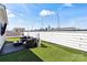 This rooftop deck provides a great view of the city and has a cozy seating area and privacy fence at 904 Van Every St, Charlotte, NC 28205