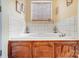 Relaxing bathroom featuring a soaking tub with wooden accents and a window for natural light at 932 Dovefield Dr, York, SC 29745