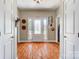 Bright foyer features gleaming hardwood floors and elegant entryway with ample natural light at 932 Dovefield Dr, York, SC 29745