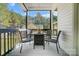 Outdoor patio with a table and chairs, offering an inviting space for outdoor dining and relaxation at 932 Dovefield Dr, York, SC 29745