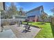 A beautiful backyard with a patio and view of shed, perfect for outdoor entertaining at 106 Orange St, Charlotte, NC 28205