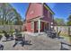A beautiful backyard with a patio, outdoor seating, and a grill, perfect for outdoor entertaining at 106 Orange St, Charlotte, NC 28205