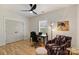 Relaxing bedroom features light walls and hardwood flooring at 106 Orange St, Charlotte, NC 28205