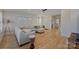 Open-concept living room features hardwood floors and natural light at 106 Orange St, Charlotte, NC 28205