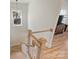 Staircase leading to the living room with natural lighting at 106 Orange St, Charlotte, NC 28205