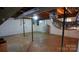 Unfinished basement space with concrete flooring, exposed utilities and white cinder block walls at 1206 Spring Dr, Shelby, NC 28150