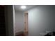Hallway leading to the basement with access to other rooms at 1206 Spring Dr, Shelby, NC 28150