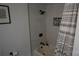 Updated bathroom features tiled shower with matte black fixtures at 1206 Spring Dr, Shelby, NC 28150