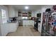 Modern kitchen featuring white cabinets, stainless steel appliances, and granite countertops at 1206 Spring Dr, Shelby, NC 28150
