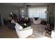 Bright living room with comfortable seating and a large window offering natural light at 1206 Spring Dr, Shelby, NC 28150