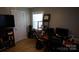 Home office space with natural light, computer desk, and modern accessories at 1206 Spring Dr, Shelby, NC 28150