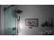 Modern tiled shower featuring a rainfall shower head and shower niche for storage at 1206 Spring Dr, Shelby, NC 28150
