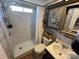 Modern bathroom featuring a sleek, tiled shower and updated fixtures at 134 Cardinal Ave, New London, NC 28127