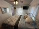 Comfortable bedroom with a cozy bed, natural light, and a calming ambiance at 134 Cardinal Ave, New London, NC 28127
