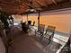 Outdoor covered patio area, perfect for dining, relaxing, and entertaining guests at 134 Cardinal Ave, New London, NC 28127