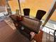 Cozy covered patio area with a bar and seating, ideal for entertaining at 134 Cardinal Ave, New London, NC 28127