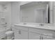 Bathroom with double sinks, a large mirror, and a bathtub/shower combo at 1346 37Th Avenue Ne Ln, Hickory, NC 28601