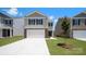 Charming two-story home with a two-car garage, stone accents, and a well-manicured lawn at 1346 37Th Avenue Ne Ln, Hickory, NC 28601