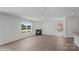 Bright living room with a fireplace and large windows, perfect for cozy evenings and ample natural light at 1346 37Th Avenue Ne Ln, Hickory, NC 28601