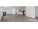 Open concept living room with fireplace flowing into a modern kitchen with granite countertops and stainless appliances at 1346 37Th Avenue Ne Ln, Hickory, NC 28601