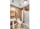 Small bathroom with shower and pedestal sink at 14314 Lissadell Cir, Charlotte, NC 28277