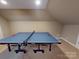 Spacious game room complete with ping pong table at 14314 Lissadell Cir, Charlotte, NC 28277